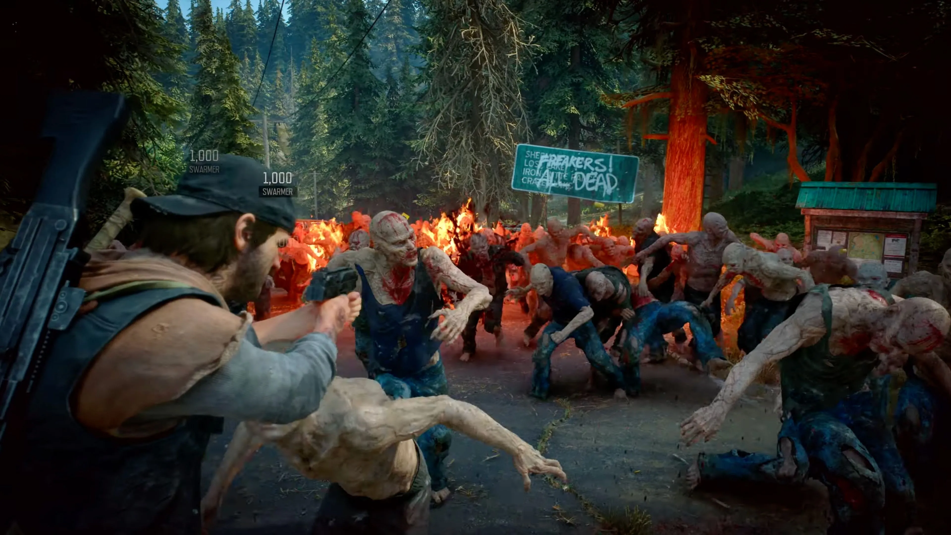 Deacon St. John lái mô tô vượt qua những khu rừng hoang sơ trong Days Gone Remastered, thể hiện đồ họa nâng cấp