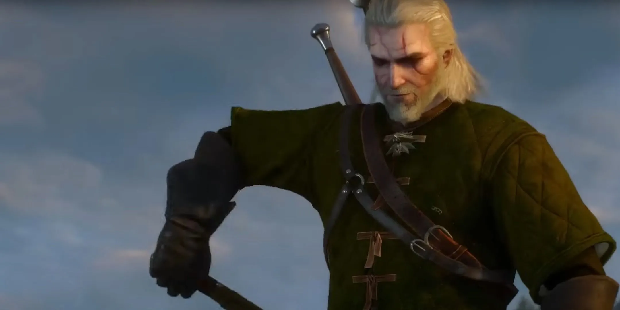 Geralt của Rivia với chiến lợi phẩm quái vật Griffin trong The Witcher 3, minh họa việc giúp đỡ &quot;người thương&quot;