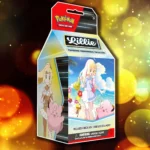 Hộp Premium Tournament Collection của Lillie trong Pokemon TCG, thể hiện thiết kế đặc trưng và các thẻ bài Lillie