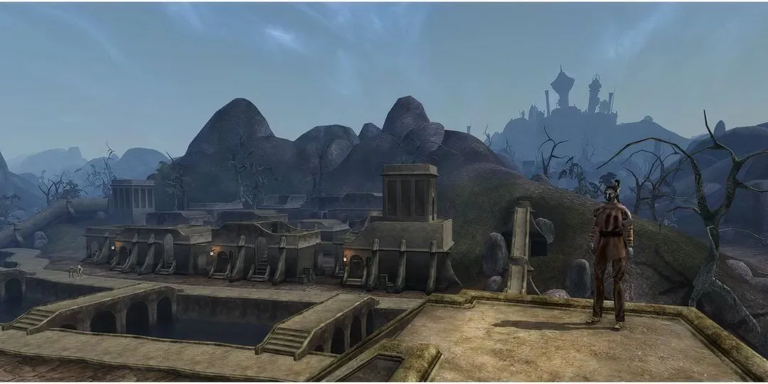 Một Elf bóng tối ngồi trên mái nhà ở Balmora trong Morrowind, phản ánh cuộc sống đời thường.