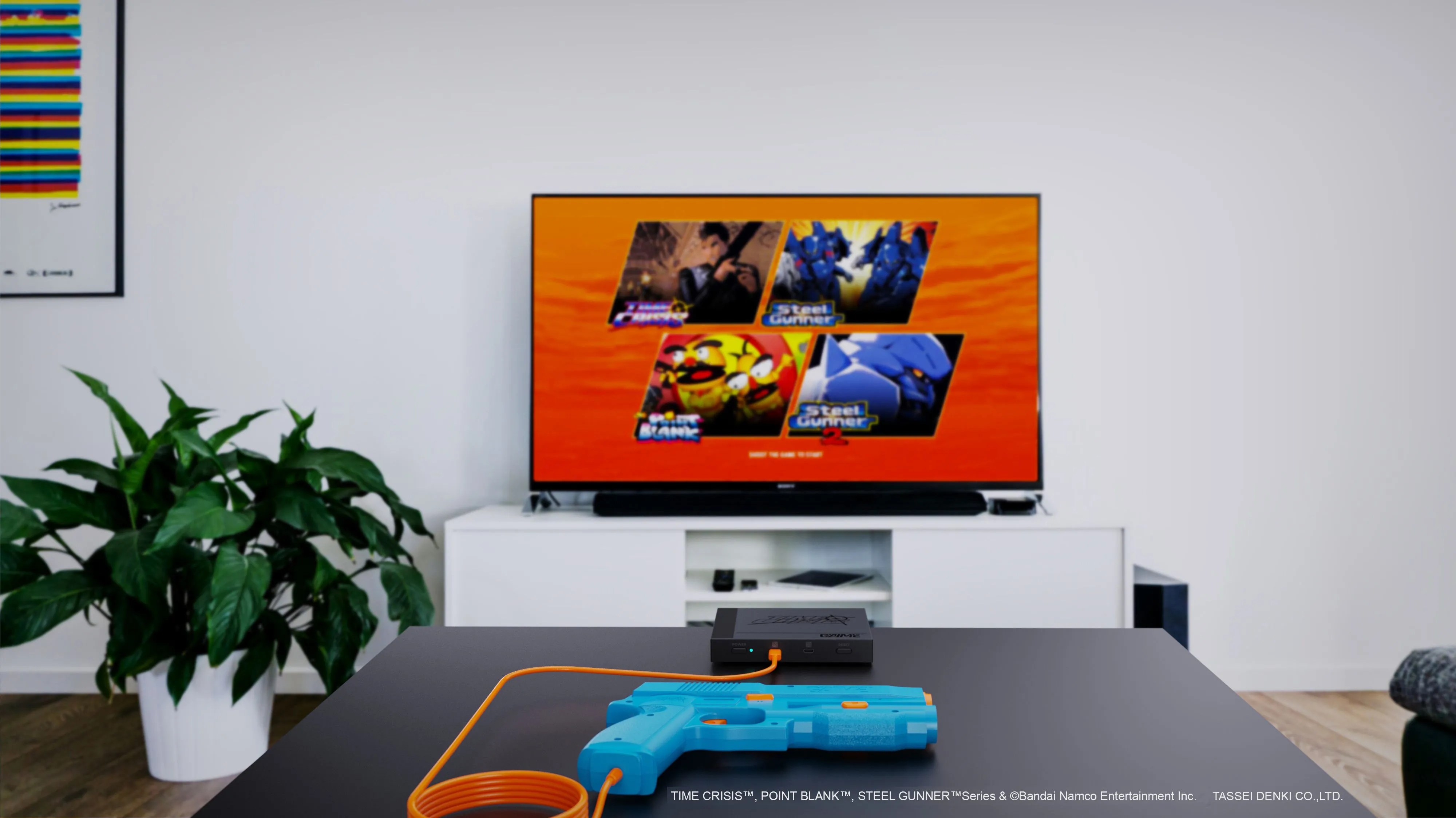 Súng light gun G'aim'e Plug & Play hiển thị trên màn hình TV hiện đại, thể hiện công nghệ mới tái hiện game bắn súng thùng.